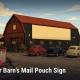 Fostoria News Historic Ohio barn with Mail Pouch sign and vintage cars.